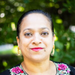Samina Hadi-Tabassum, Elmhurst University