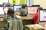 Fine art majors work in a computer lab as part of the bachelor of fine art program at Elmhurst University.