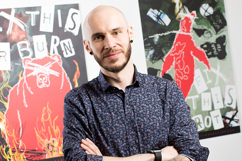 Graphic design professor Andrew Sobol encourages his Elmhurst College students to push the limits of their creativity.