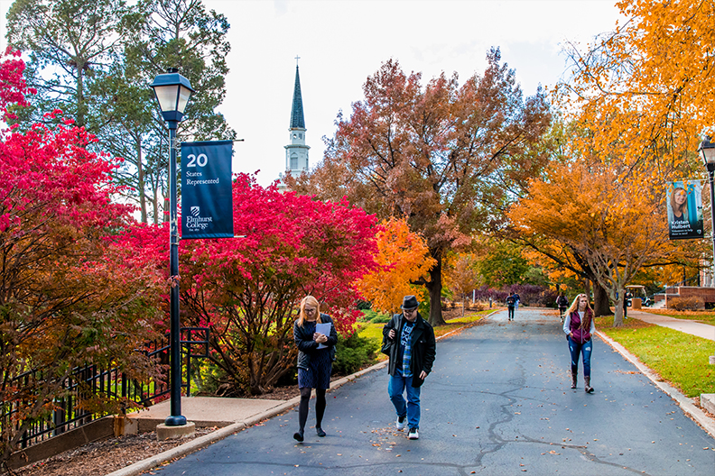 A photo of students walking on Elmhurst College's arboretum campus.