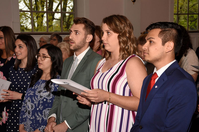 Elmhurst College Senior of the Year award finalists look on during the 2019 Founders' Honors Convocation ceremony.